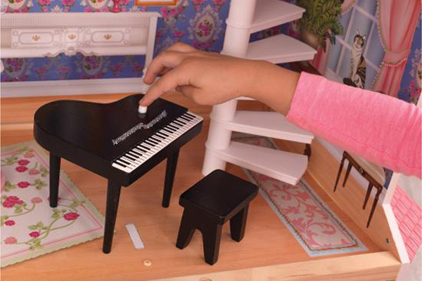 Das Klavier macht Musik, wenn du die Taste drückst